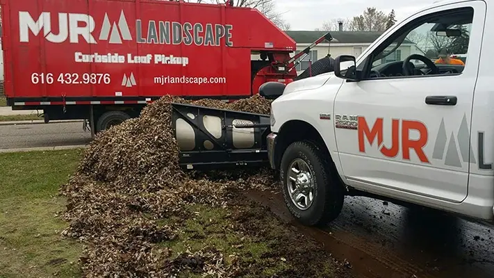 MJR Landscape truck removing leaves